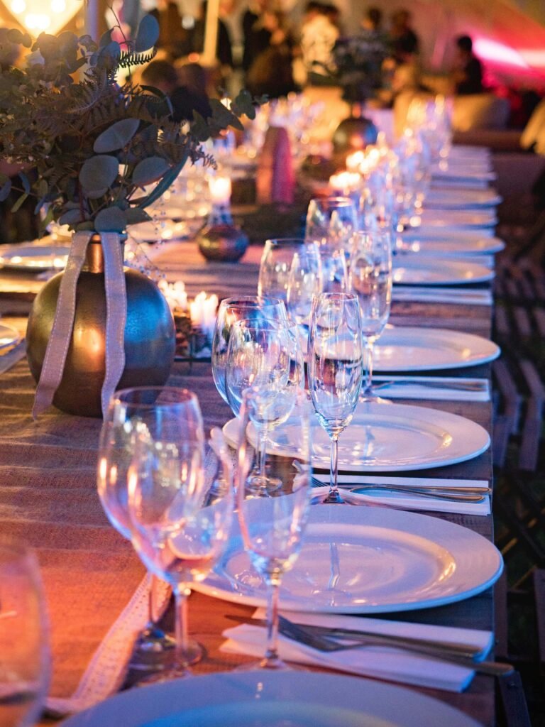 pexels-photo-1114425-1114425 A beautifully set dinner table with candles and glassware, perfect for elegant events.
